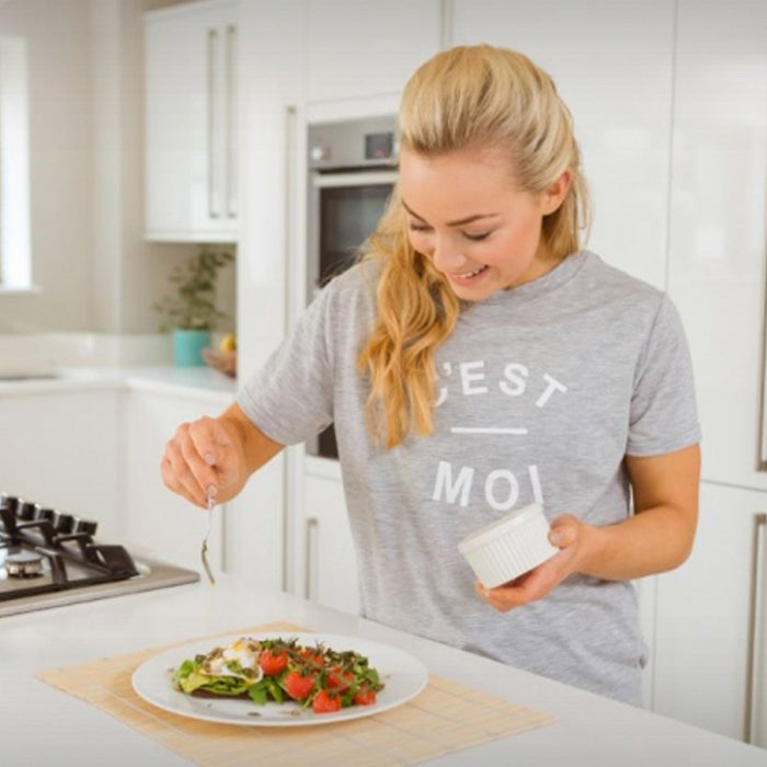 Poached Egg On Rye Toast With A Chilli And Basil Drizzle